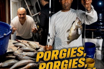 Two men on a boat holding fish, with text promoting 'Sea Queen VII'.